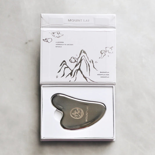 The Stainless Steel Gua Sha Lifting Facial Tool by Mount Lai