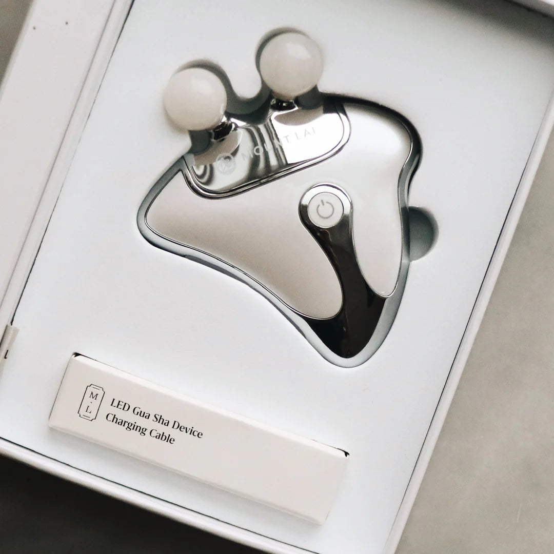 The Vitality Qi LED Gua Sha Device with Protective Pouch by Mount Lai