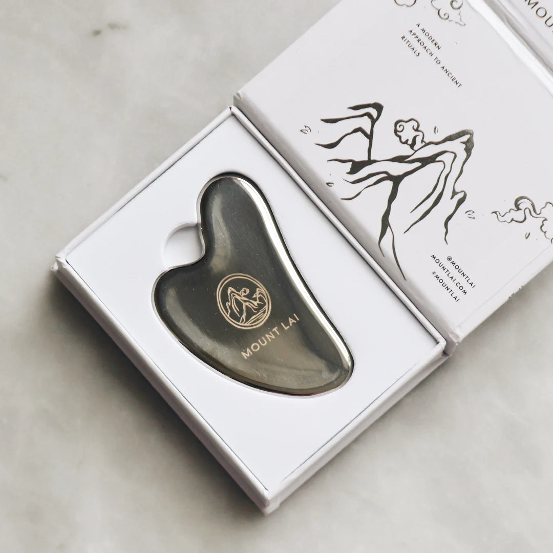 The Stainless Steel Gua Sha Lifting Facial Tool by Mount Lai