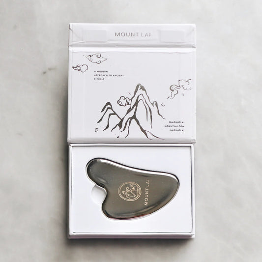 The Stainless Steel Gua Sha Lifting Facial Tool by Mount Lai