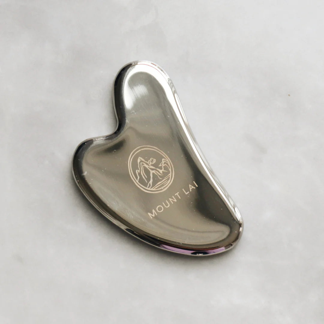 The Stainless Steel Gua Sha Lifting Facial Tool by Mount Lai
